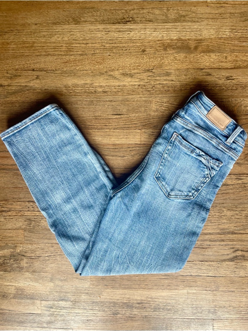 Buckle Straight Leg Jeans in Light Blue
